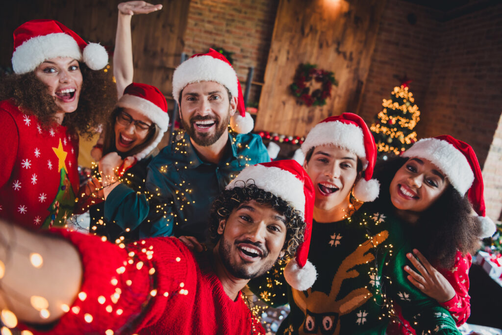 photo of cheerful young people friends group take selfie photo cheerful smile cozy christmas party decor spacious apartment indoors