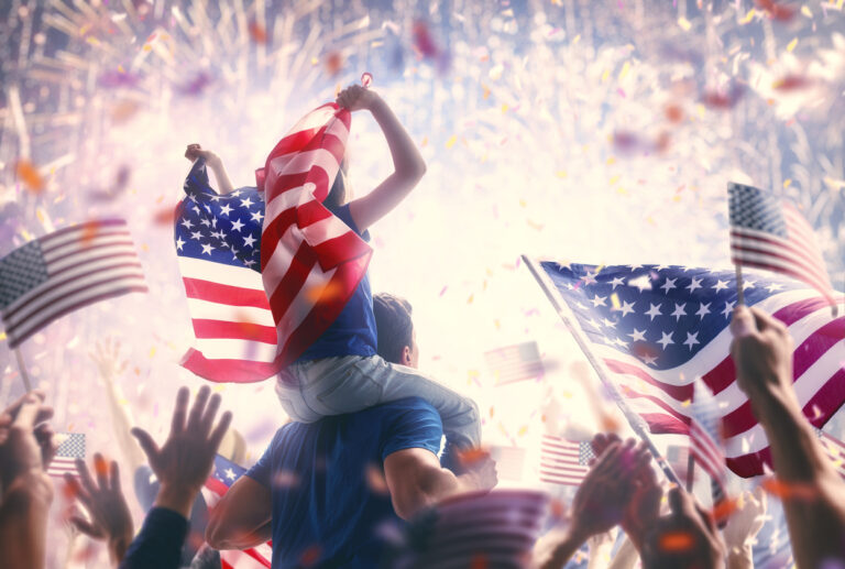 people holding the flags of the usa.